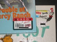 used sticker on book