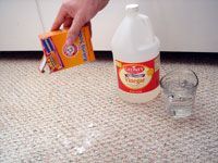 pouring baking soda on stain