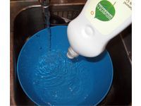 Water in a bucket and dish soap
