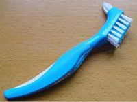 blue soft-bristled brush