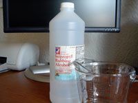 bottle of rubbing alcohol and water