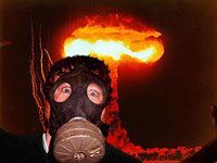 guy in gas mask in front of nuclear explosion