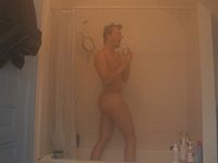 person steaming in shower