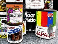 cans of old latex paint