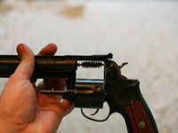 Wire brush through revolver