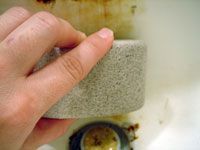 scrubbing with pumice stone