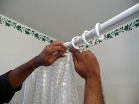 Taking shower curtain off the rings
