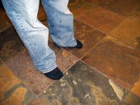 using socks to clean grout