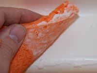 Scrubbing with a sponge
