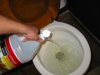 Pouring vinegar into bowl