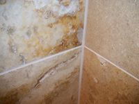 badly stained travertine