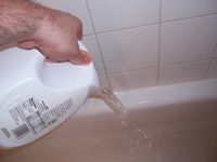 rinsing sides of tub