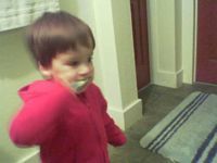 little kid brushing teeth