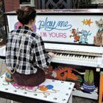 Person playing a piano