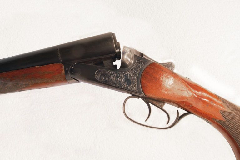 A double barrel shotgun.